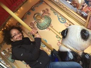 Gennelle on a carousel in San Francisco